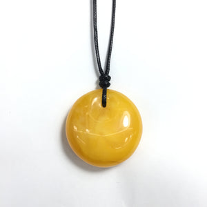 Synthetic Amber 48x22mm Donut With Cotton Cord Necklace