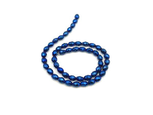 Hematite Coated Blue Faceted Rice 10X20Mm