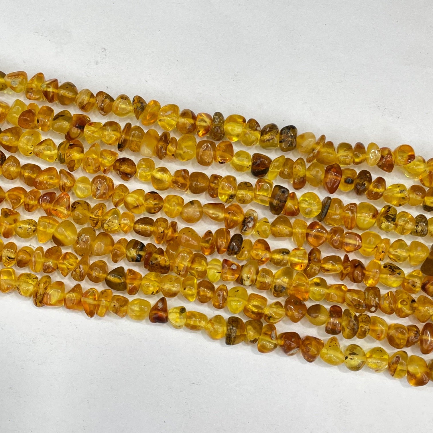 Baltic Amber AB Grade Freeform 6X9mm 15.5 in strand
