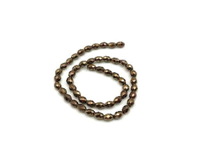 Hematite Coated Tan Faceted Rice 3X5Mm