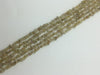 Rutilated Quartz Gold G1 Chips 16 Inch 5-8Mm