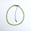Peridot Super Precision Cut Roundel 2X3mm bracelet