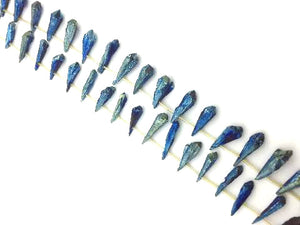 Coated Crystal Quartz Blue Stick 7X30-12X33Mm