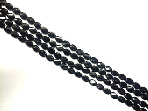 Black Onxy Faceted Twisted 10X14Mm