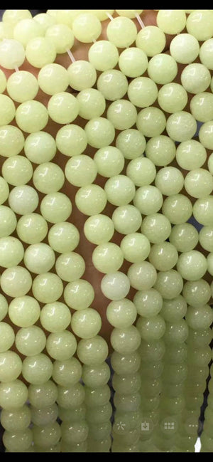 Light green luminous stone beads 8mm ( man made stone )